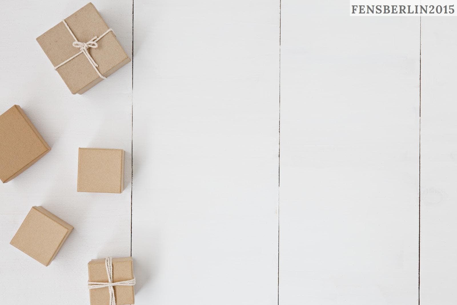 brown gift box on white surface