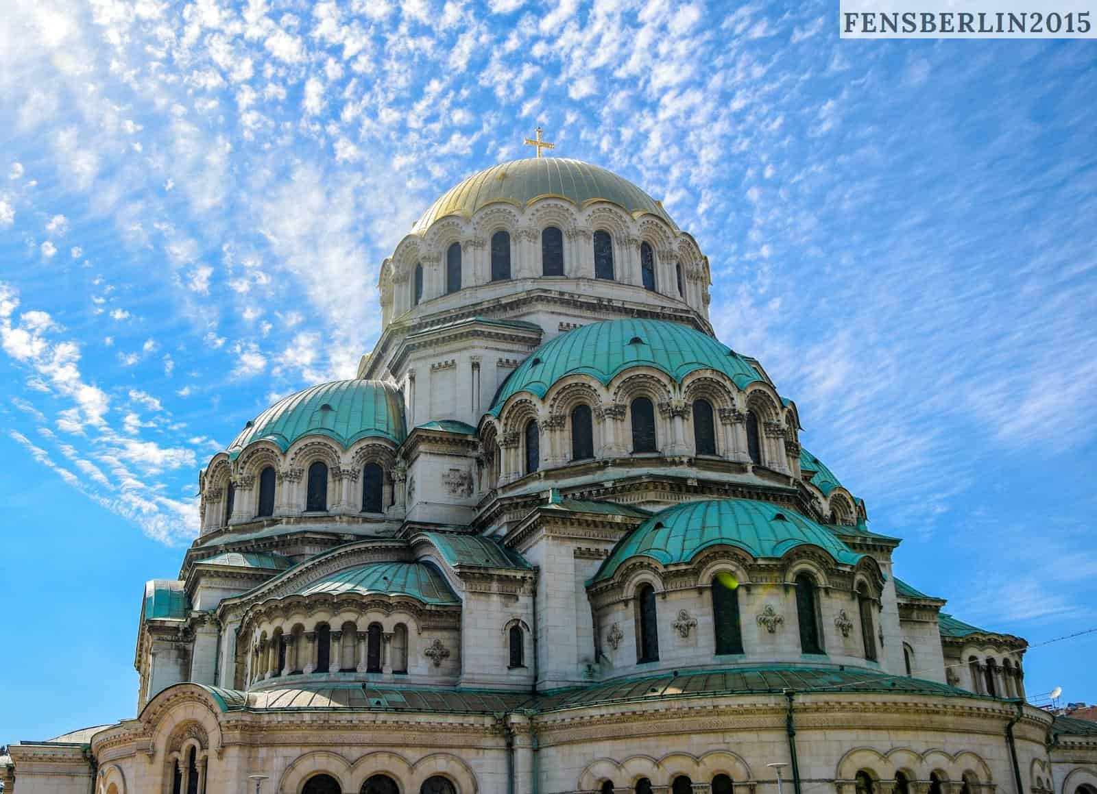 green and blue dome building under blue sky during daytime